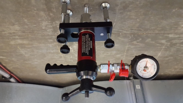 Testing chemical fix stud on ceiling using Hydrajaws Tensile Tester with Calibrated Gauge